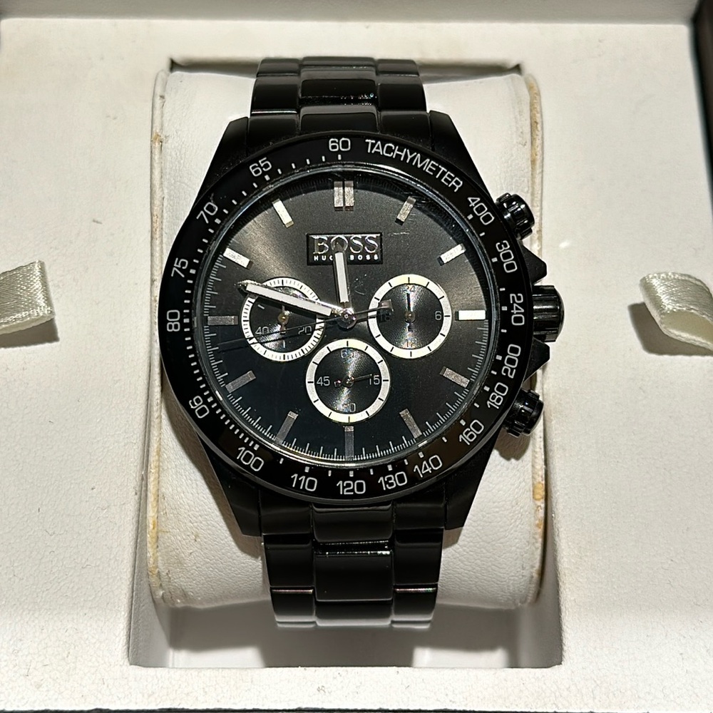 Hugo Boss Black Stainless Steel Watch 
Color: Black
Band: Black 
Condition: Used
